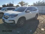 ✅ 2022 Honda Pilot Touring 7-Passenger • VIN: 5FNYF6H60NB060737 • Lot: 85911665. Listed on Copart with Not provided. Free auction sales archive from the USA and detailed vehicle history report at DreamBid. Image 1.