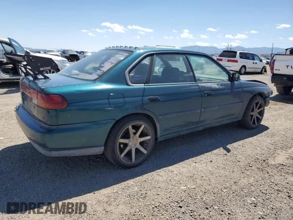 ✅ 1996 Subaru Legacy L • VIN: 4S3BD4350T6202978 • Lot: 64322025. Wystawiony na Copart z przebiegiem 294 847 mil. Bezpłatny archiwum sprzedaży aukcyjnych z USA i szczegółowy raport historii pojazdu na DreamBid. Zdjęcie 3.