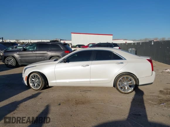 ✅ 2018 Cadillac ATS RWD • VIN: 1G6AA5RX4J0114084 • Лот: 41761517. Опубликован ранее на IAAI с пробегом 104 747 миль. Бесплатный доступ к архиву аукционных продаж из США и подробный отчёт об истории автомобиля на DreamBid. Изображение 14.