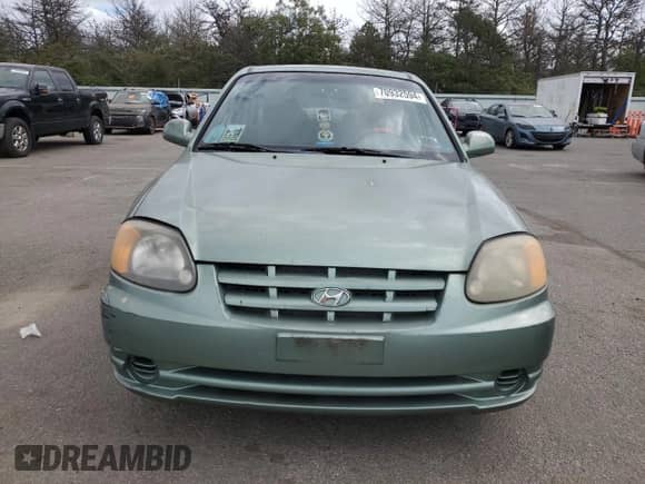 2003 Hyundai Accent GL с VIN KMHCG45CX3U497134, выставлен на аукционе Copart как лот 70932594 с пробегом 107 980 миль миль и Чистый • Clean title. История ставок и продаж доступна на DreamBid. Изображение 5.