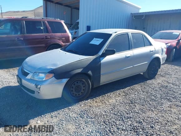 ✅ 2001 Mazda Protege LX • VIN: JM1BJ226910401437 • Lot: 43548017. Wystawiony na IAAI z przebiegiem 236 866 mil. Bezpłatny archiwum sprzedaży aukcyjnych z USA i szczegółowy raport historii pojazdu na DreamBid. Zdjęcie 2.