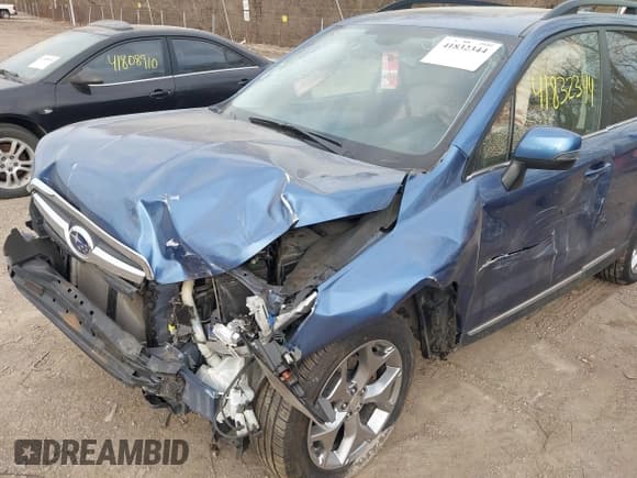 ✅ 2016 Subaru Forester Touring • VIN: JF2SJAXC4GH417596 • Lot: 41832344. Listed on IAAI with 88,735 mi. Free auction sales archive from the USA and detailed vehicle history report at DreamBid. Image 6.