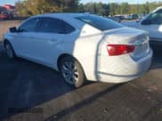 ✅ 2017 Chevrolet Impala LT • VIN: 2G1105SA8H9142176 • Lot: 43580865. Wystawiony na IAAI z przebiegiem 300 615 mil. Bezpłatny archiwum sprzedaży aukcyjnych z USA i szczegółowy raport historii pojazdu na DreamBid. Zdjęcie 3.