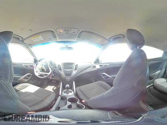 2016 Hyundai Veloster с VIN KMHTC6ADXGU264611, выставлен на аукционе Copart как лот 62671474 с пробегом 106 102 миль миль и Списание • Salvage title. История ставок и продаж доступна на DreamBid. Изображение 13.