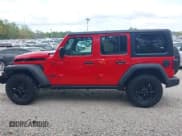 ✅ 2023 Jeep Wrangler Sport • VIN: 1C4HJXDGXPW576105 • Lot: 41743632. Wystawiony na IAAI z przebiegiem 30 049 mil. Bezpłatny archiwum sprzedaży aukcyjnych z USA i szczegółowy raport historii pojazdu na DreamBid. Zdjęcie 14.