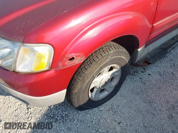 ✅ 2003 Ford Explorer Sport Trac XLS • VIN: 1FMZU77E13UA10177 • Lot: 42827559. Wystawiony na IAAI z przebiegiem 126 158 mil. Bezpłatny archiwum sprzedaży aukcyjnych z USA i szczegółowy raport historii pojazdu na DreamBid. Zdjęcie 6.