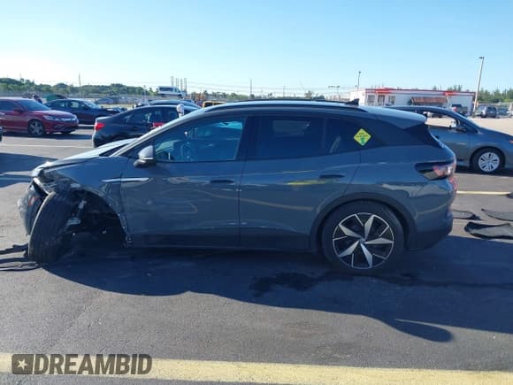 ✅ 2023 Volkswagen ID.4 S • VIN: 1V25MPE88PC040755 • Lot: 43454884. Wystawiony na IAAI z przebiegiem 8 117 mil. Bezpłatny archiwum sprzedaży aukcyjnych z USA i szczegółowy raport historii pojazdu na DreamBid. Zdjęcie 15.