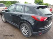 ✅ 2014 Mazda CX-5 Sport • VIN: JM3KE4BE4E0399648 • Lot: 42452015. Listed on IAAI with 105,621 mi. Free auction sales archive from the USA and detailed vehicle history report at DreamBid. Image 3.