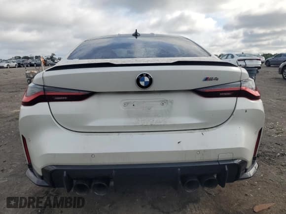 ✅ 2022 BMW M4 • VIN: WBS53AZ05NCH86997 • Lot: 65124395. Listed on Copart with 69,657 mi. Free auction sales archive from the USA and detailed vehicle history report at DreamBid. Image 6.