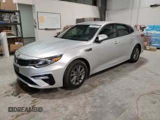 ✅ 2020 Kia Optima LX • VIN: 5XXGT4L31LG447619 • Lot: 90059345. Listed on Copart with 154,986 mi. Free auction sales archive from the USA and detailed vehicle history report at DreamBid. Image 1.