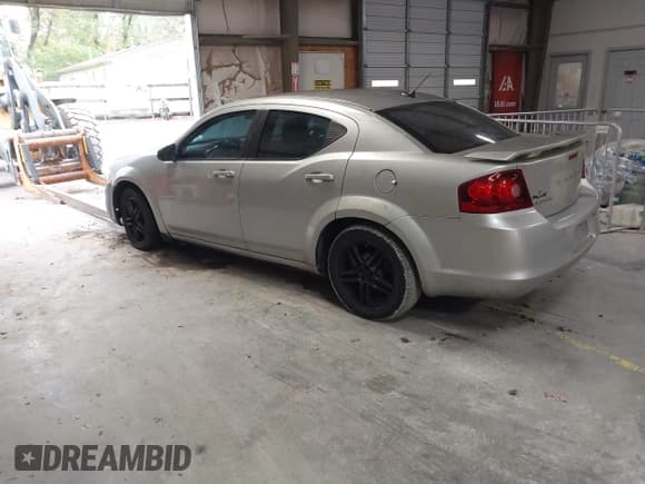 ✅ 2012 Dodge Avenger SE • VIN: 1C3CDZAB4CN215981 • Lot: 43569656. Listed on IAAI with 134,833 mi. Free auction sales archive from the USA and detailed vehicle history report at DreamBid. Image 3.