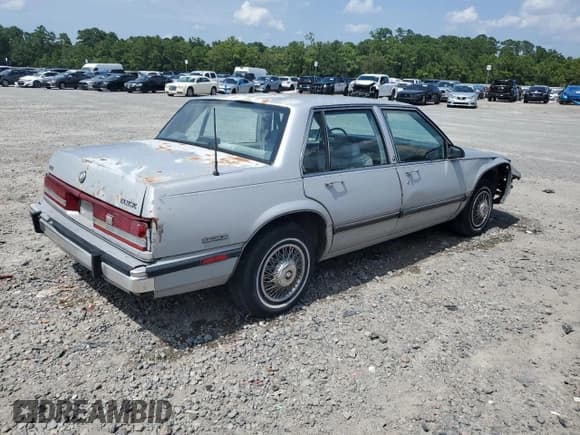 ✅ 1990 Buick LeSabre Custom • VIN: 1G4HP54C8LH461111 • Лот: 65467434. Опубликован ранее на Copart с пробегом 287 506 миль. Бесплатный доступ к архиву аукционных продаж из США и подробный отчёт об истории автомобиля на DreamBid. Изображение 3.