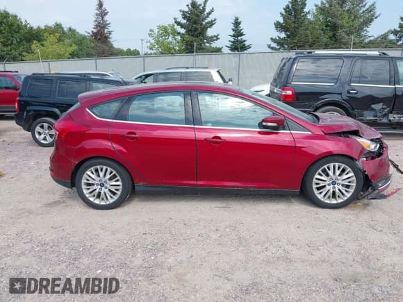 ✅ 2017 Ford Focus Titanium • VIN: 1FADP3N22HL302561 • Lot: 43252752. Listed on IAAI with 129,322 mi. Free auction sales archive from the USA and detailed vehicle history report at DreamBid. Image 13.