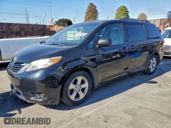 ✅ 2015 Toyota Sienna LE • VIN: 5TDKK3DC2FS664704 • Lot: 95775925. Listed on Copart with 182,327 mi. Free auction sales archive from the USA and detailed vehicle history report at DreamBid. Image 1.