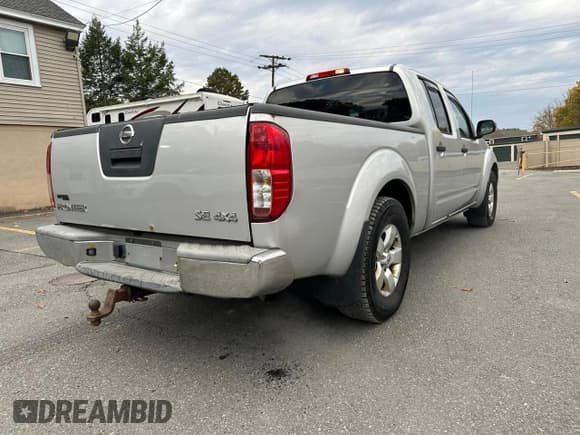✅ 2009 Nissan Frontier SE • VIN: 1N6AD09W89C411798 • Lot: 77967144. Listed on Copart with 210,803 mi. Free auction sales archive from the USA and detailed vehicle history report at DreamBid. Image 3.
