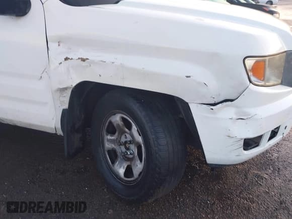 ✅ 2013 Honda Ridgeline RT • VIN: 5FPYK1F22DB006697 • Lot: 41421707. Wystawiony na IAAI z przebiegiem 233 724 mil. Bezpłatny archiwum sprzedaży aukcyjnych z USA i szczegółowy raport historii pojazdu na DreamBid. Zdjęcie 6.