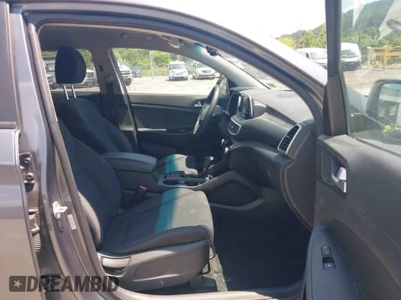 2019 Hyundai Tucson Value with VIN KM8J33A46KU052965, listed as a IAAI auction lot 42662016 with 115,861 mi miles and . Bid and sale history available at DreamBid. Image 5.