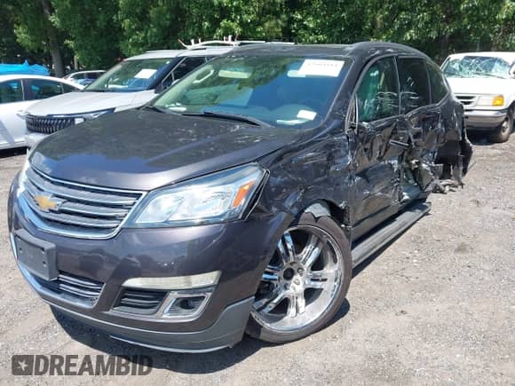 2014 Chevrolet Traverse LT z VIN 1GNKRGKD6EJ290499, wystawiony jako IAAI lot #42604884 z przebiegiem 169 701 mil mil oraz . Historia ofert i sprzedaży dostępna na DreamBid. Obrazek 17.