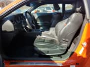 ✅ 2009 Dodge Challenger SRT-8 • VIN: 2B3LJ74W09H563075 • Lot: 76766354. Wystawiony na Copart z przebiegiem 75 047 mil. Bezpłatny archiwum sprzedaży aukcyjnych z USA i szczegółowy raport historii pojazdu na DreamBid. Zdjęcie 7.