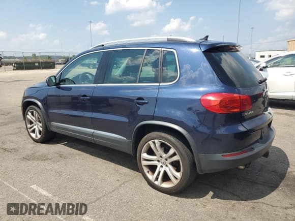 ✅ 2013 Volkswagen Tiguan SE • VIN: WVGBV7AX8DW548874 • Lot: 68422725. Listed on Copart with 120,340 mi. Free auction sales archive from the USA and detailed vehicle history report at DreamBid. Image 2.