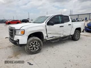 ✅ 2021 GMC Canyon 4WD AT4 • VIN: 1GTG6FEN0M1273962 • Лот: 59429235. Опубликован ранее на Copart с пробегом 47 894 миль. Бесплатный доступ к архиву аукционных продаж из США и подробный отчёт об истории автомобиля на DreamBid. Изображение 1.