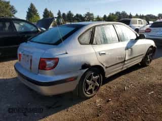 2005 Hyundai Elantra GLS z VIN KMHDN56DX5U150770, wystawiony jako Copart lot #72943264 z przebiegiem 196 876 mil mil oraz Szkoda całkowita • Salvage title. Historia ofert i sprzedaży dostępna na DreamBid. Obrazek 3.
