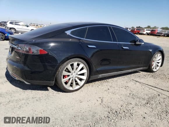 ✅ 2014 Tesla Model S P85D • VIN: 5YJSA1H20EFP65767 • Lot: 65092365. Listed on Copart with 109,629 mi. Free auction sales archive from the USA and detailed vehicle history report at DreamBid. Image 3.