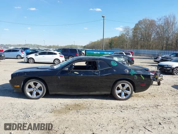 ✅ 2013 Dodge Challenger SXT • VIN: 2C3CDYAG0DH629128 • Lot: 41890327. Wystawiony na IAAI z przebiegiem Nie podano. Bezpłatny archiwum sprzedaży aukcyjnych z USA i szczegółowy raport historii pojazdu na DreamBid. Zdjęcie 15.