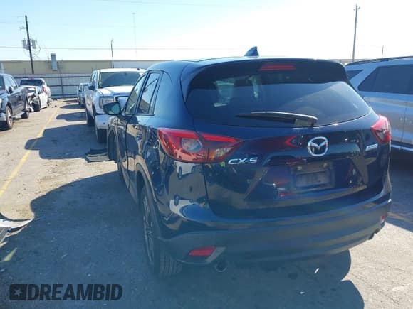✅ 2016 Mazda CX-5 Grand Touring • VIN: JM3KE2DY7G0848772 • Лот: 43587656. Опубликован ранее на IAAI с пробегом 85 056 миль. Бесплатный доступ к архиву аукционных продаж из США и подробный отчёт об истории автомобиля на DreamBid. Изображение 3.