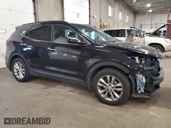 2017 Hyundai Santa Fe 2.0T z VIN 5XYZUDLA8HG501201, wystawiony jako Copart lot #59210375 z przebiegiem 204 785 mil mil oraz Szkoda całkowita • Salvage title. Historia ofert i sprzedaży dostępna na DreamBid. Obrazek 4.