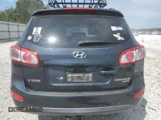 2011 Hyundai Santa Fe SE z VIN 5XYZHDAG4BG061528, wystawiony jako Copart lot #70642964 z przebiegiem 168 666 mil mil oraz Szkoda całkowita • Salvage title. Historia ofert i sprzedaży dostępna na DreamBid. Obrazek 6.