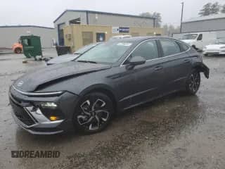 2025 Hyundai Sonata SEL with VIN KMHL64JA6SA502773, listed as a Copart auction lot 90327405 with 6,770 mi miles and Salvage title. Bid and sale history available at DreamBid. Image 1.