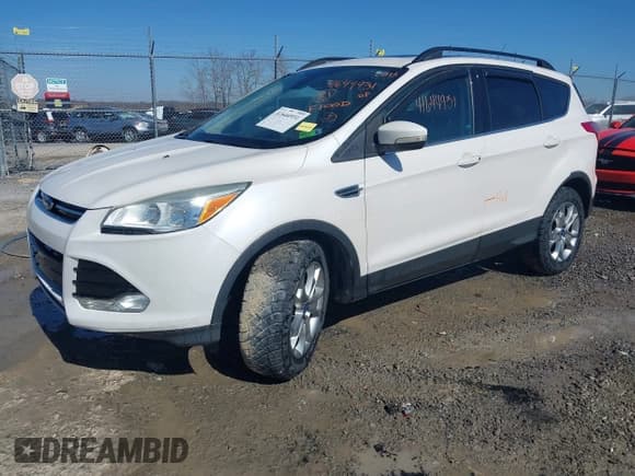 ✅ 2013 Ford Escape SEL • VIN: 1FMCU9HX1DUB37918 • Лот: 41644931. Опубликован ранее на IAAI с пробегом 153 726 миль. Бесплатный доступ к архиву аукционных продаж из США и подробный отчёт об истории автомобиля на DreamBid. Изображение 2.