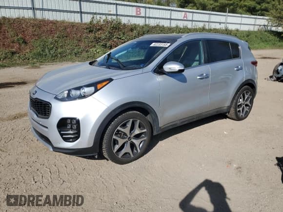 ✅ 2017 Kia Sportage SX Turbo • VIN: KNDPR3A69H7067319 • Lot: 82233155. Listed on Copart with 106,970 mi. Free auction sales archive from the USA and detailed vehicle history report at DreamBid. Image 1.