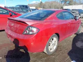2008 Hyundai Tiburon GS z VIN KMHHM66D58U282754, wystawiony jako IAAI lot #41413249 z przebiegiem 134 052 mil mil oraz . Historia ofert i sprzedaży dostępna na DreamBid. Obrazek 4.