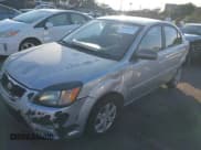 ✅ 2010 Kia Rio LX • VIN: KNADH4A38A6673706 • Lot: 43645629. Listed on IAAI with 145,094 mi. Free auction sales archive from the USA and detailed vehicle history report at DreamBid. Image 17.