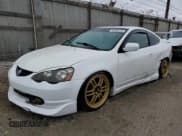 ✅ 2002 Acura RSX Auto • VIN: JH4DC548X2C034663 • Лот: 55980275. Опубликован ранее на Copart с пробегом 165 809 миль. Бесплатный доступ к архиву аукционных продаж из США и подробный отчёт об истории автомобиля на DreamBid. Изображение 1.