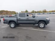 ✅ 2023 Toyota Tacoma TRD Off Road • VIN: 3TMCZ5AN5PM571369 • Lot: 43559181. Listed on IAAI with 56,795 mi. Free auction sales archive from the USA and detailed vehicle history report at DreamBid. Image 13.
