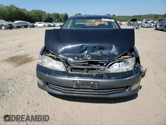 ✅ 2000 Lexus ES 300 • VIN: JT8BF28G4Y5100202 • Лот: 86711005. Опубликован ранее на Copart с пробегом 159 493 миль. Бесплатный доступ к архиву аукционных продаж из США и подробный отчёт об истории автомобиля на DreamBid. Изображение 13.