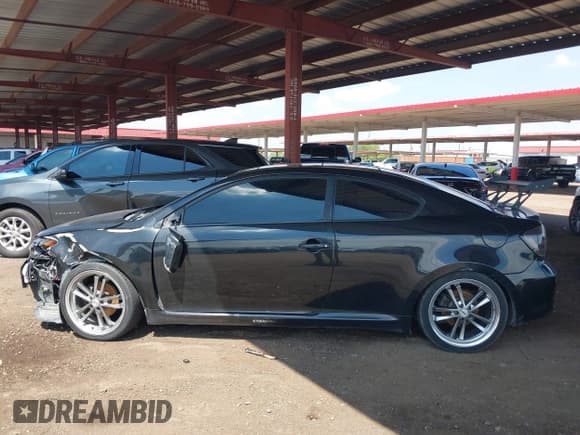 ✅ 2005 Scion tC • VIN: JTKDE177150040518 • Lot: 43085255. Listed on IAAI with 196,535 mi. Free auction sales archive from the USA and detailed vehicle history report at DreamBid. Image 14.