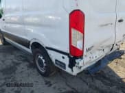 ✅ 2021 Ford Transit Cargo • VIN: 1FTYE1Y89MKA16809 • Lot: 41643195. Listed on IAAI with 7,407 mi. Free auction sales archive from the USA and detailed vehicle history report at DreamBid. Image 17.