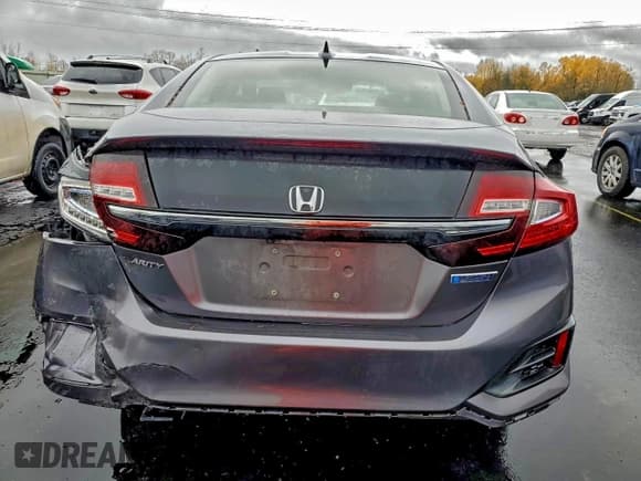 ✅ 2018 Honda Clarity • VIN: JHMZC5F11JC013740 • Lot: 95881765. Wystawiony na Copart z przebiegiem 86 895 mil. Bezpłatny archiwum sprzedaży aukcyjnych z USA i szczegółowy raport historii pojazdu na DreamBid. Zdjęcie 6.