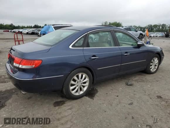 2007 Hyundai Azera SE с VIN KMHFC46F87A176797, выставлен на аукционе Copart как лот 55836555 с пробегом 120 697 миль миль и Списание • Salvage title. История ставок и продаж доступна на DreamBid. Изображение 3.