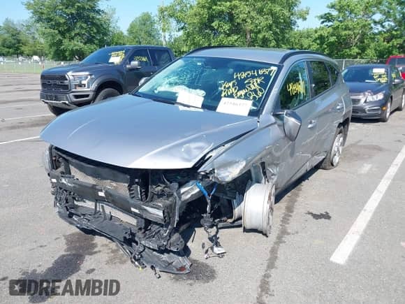 2022 Hyundai Tucson SEL with VIN KM8JBCAEXNU170081, listed as a IAAI auction lot 42546377 with 59,745 mi miles and . Bid and sale history available at DreamBid. Image 6.