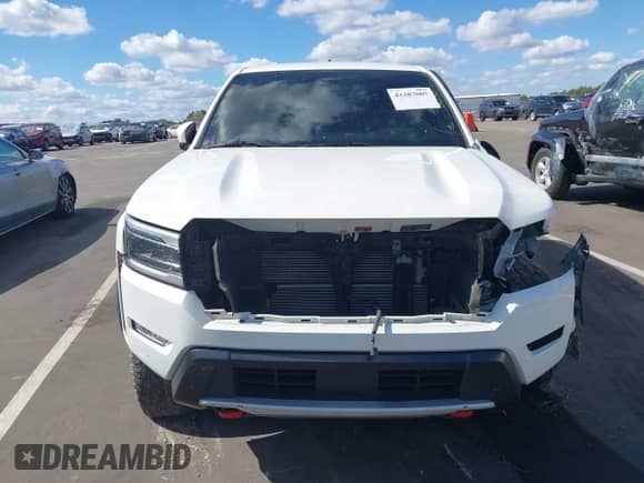 ✅ 2023 Nissan Frontier SV • VIN: 1N6ED1EKXPN630337 • Lot: 43387005. Listed on IAAI with 41,703 mi. Free auction sales archive from the USA and detailed vehicle history report at DreamBid. Image 12.