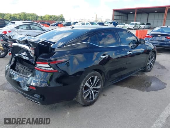 ✅ 2019 Nissan Maxima Platinum • VIN: 1N4AA6AV5KC360693 • Lot: 43299229. Listed on IAAI with 91,060 mi. Free auction sales archive from the USA and detailed vehicle history report at DreamBid. Image 4.