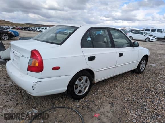 2002 Hyundai Accent GL z VIN KMHCG45C82U358523, wystawiony jako Copart lot #48247575 z przebiegiem 164 869 mil mil oraz Szkoda całkowita • Salvage title. Historia ofert i sprzedaży dostępna na DreamBid. Obrazek 3.