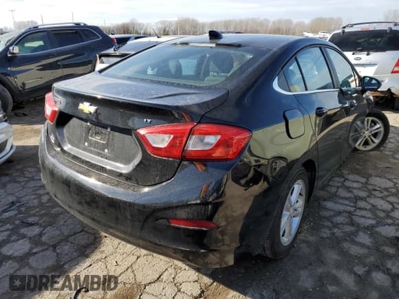 ✅ 2018 Chevrolet Cruze LT • VIN: 1G1BE5SM7J7108687 • Lot: 73537832. Listed on Copart with 87,270 mi. Free auction sales archive from the USA and detailed vehicle history report at DreamBid. Image 3.