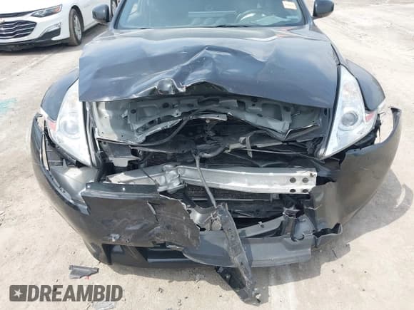 ✅ 2009 Nissan 370Z Touring • VIN: JN1AZ44E29M407088 • Lot: 42130157. Listed on IAAI with 51,735 mi. Free auction sales archive from the USA and detailed vehicle history report at DreamBid. Image 6.