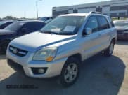 ✅ 2009 Kia Sportage EX • VIN: KNDJF723497556724 • Лот: 43623707. Опубликован ранее на IAAI с пробегом 154 032 миль. Бесплатный доступ к архиву аукционных продаж из США и подробный отчёт об истории автомобиля на DreamBid. Изображение 2.